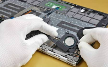 replace a cooling fan of a laptop