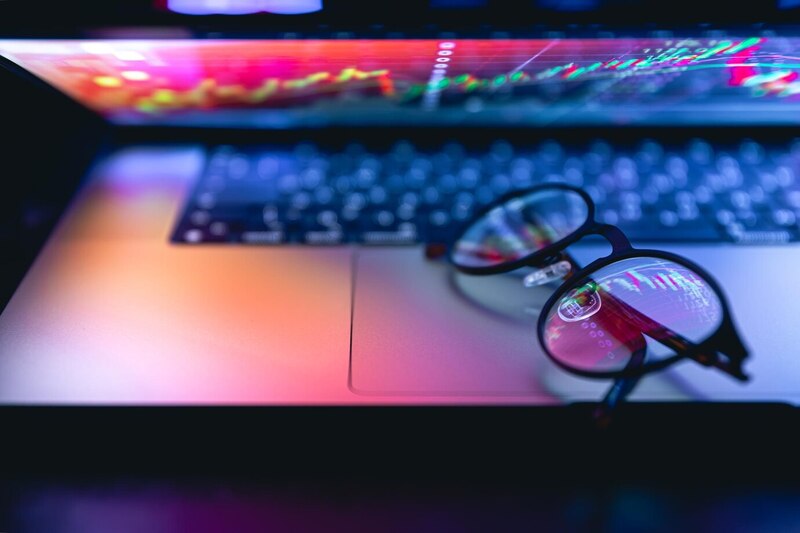 Why is My Hp Laptop So Slow Windows 10? Discover Instant Solutions! 3 A pair of glasses resting on a laptop screen, symbolizing work or study.